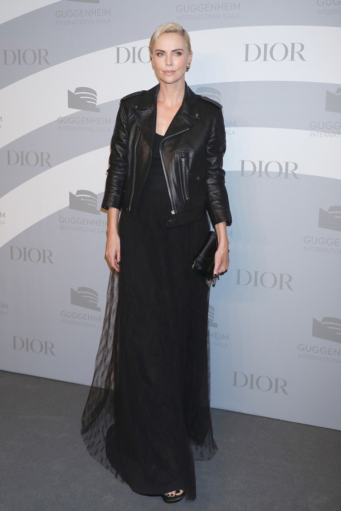 Charlize is sleek in black